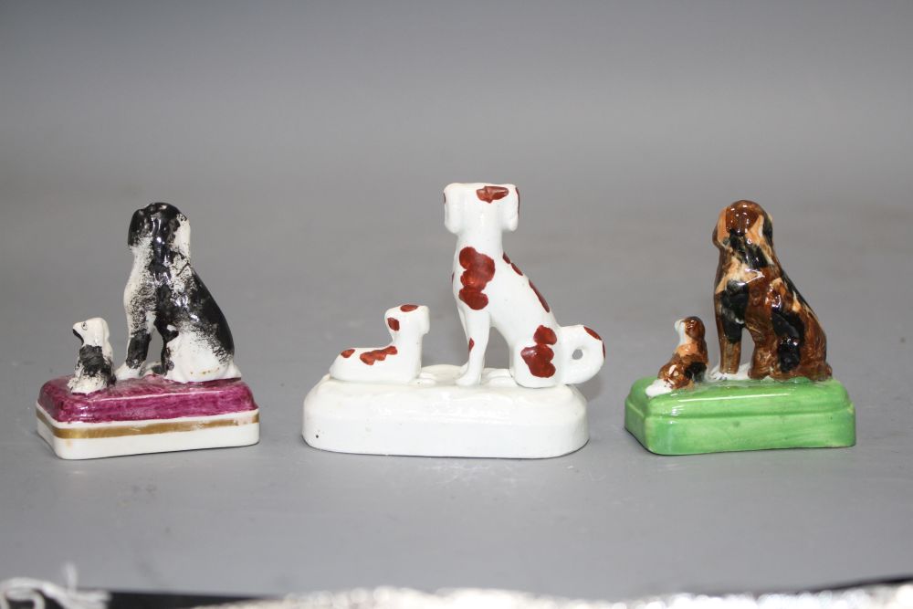 Three small Staffordshire porcelain groups of a King Charles Spaniel and puppy, c.1835-50, H. 6.2 - 6.9cm